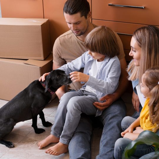 happy-family-with-dog-moving-new-home